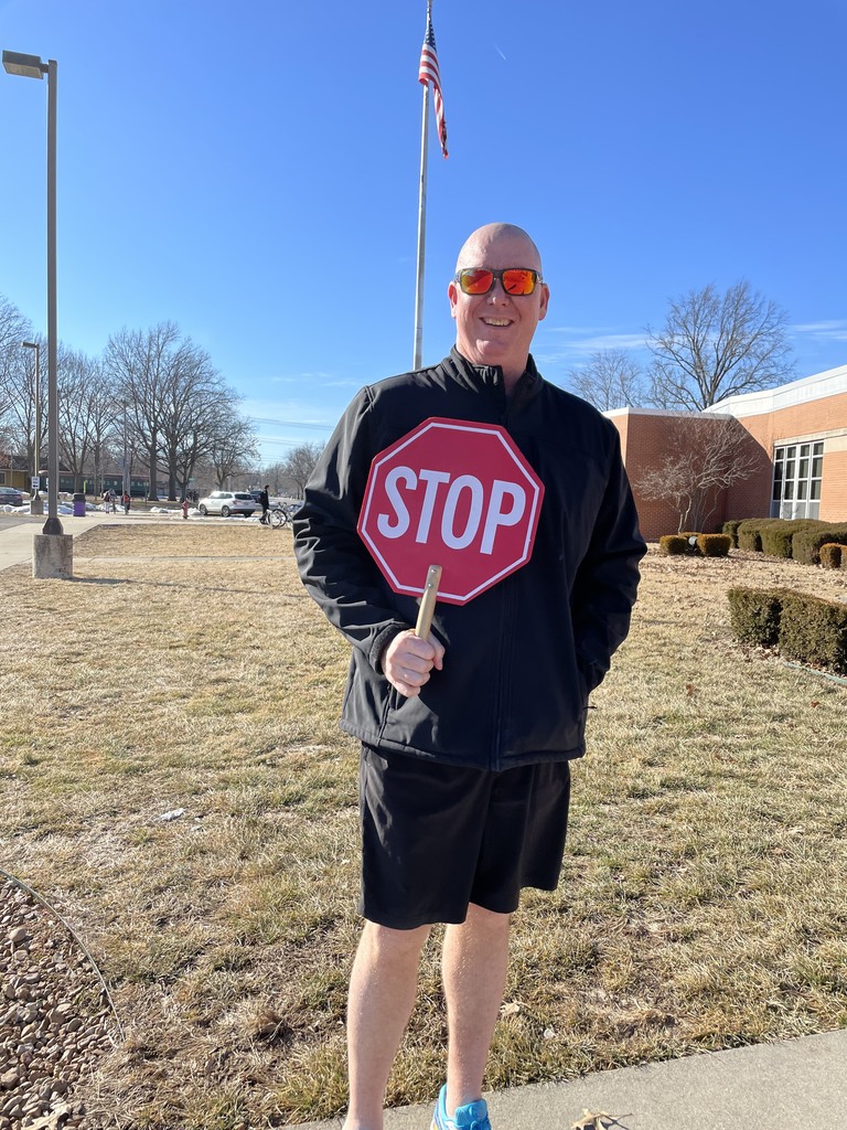 Mr. Blunt holding stop sign