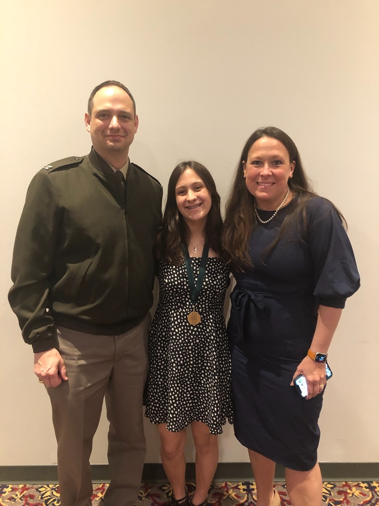 8th grade student and her parents