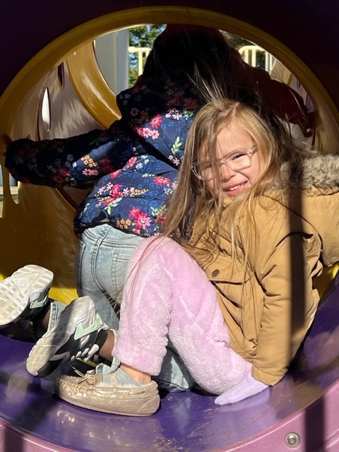 Playing on playground with friends
