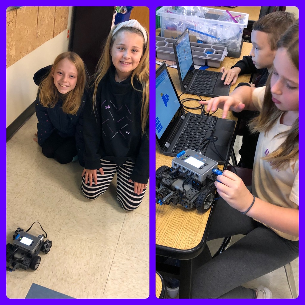 fifth graders with vex kit robots