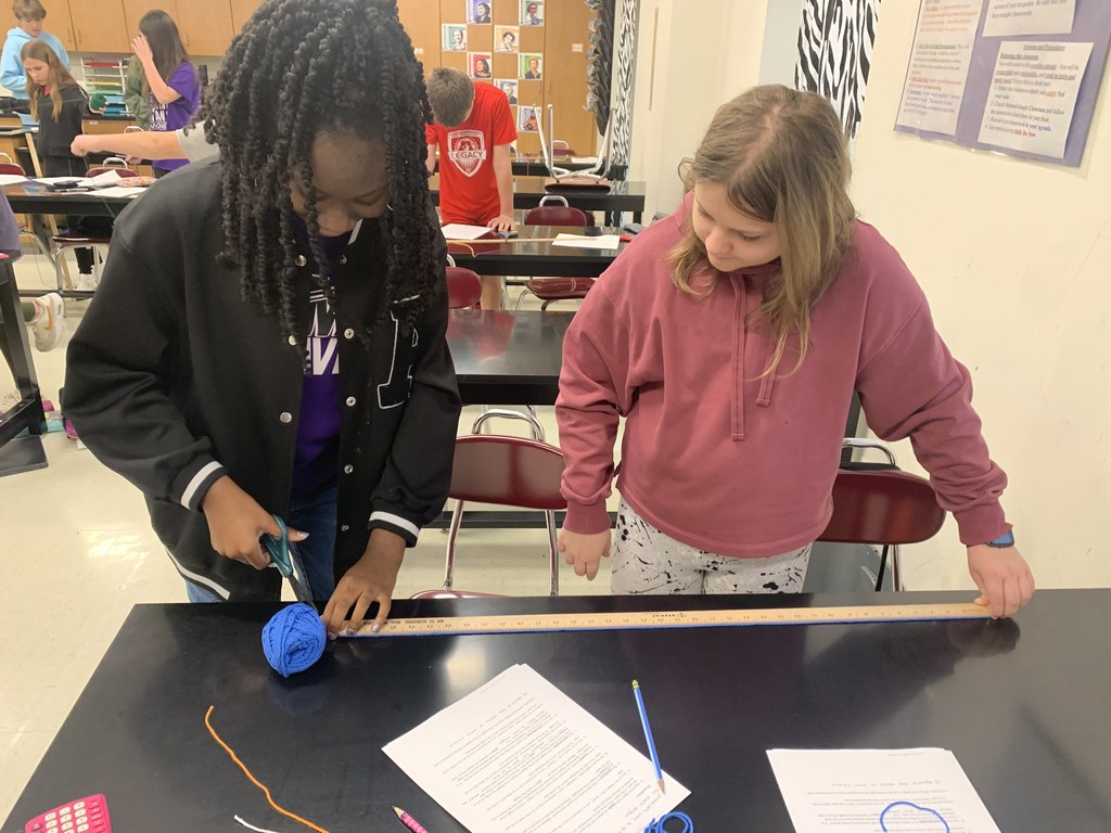 science class students measuring